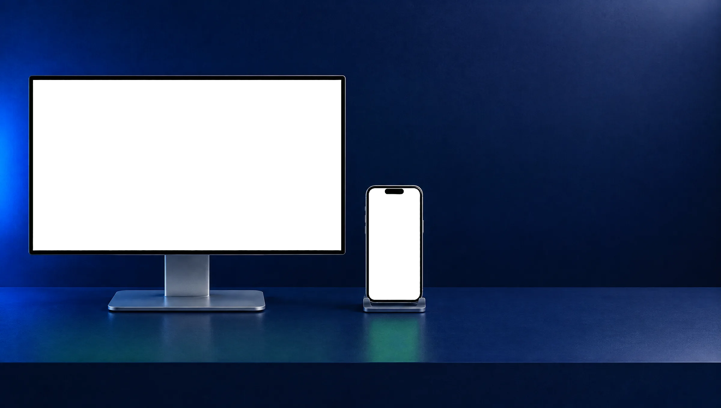 A monitor and a phone on a navy desk: an enquiry sent on the Sidra Kitchens site sets off the studio's automations on the monitor