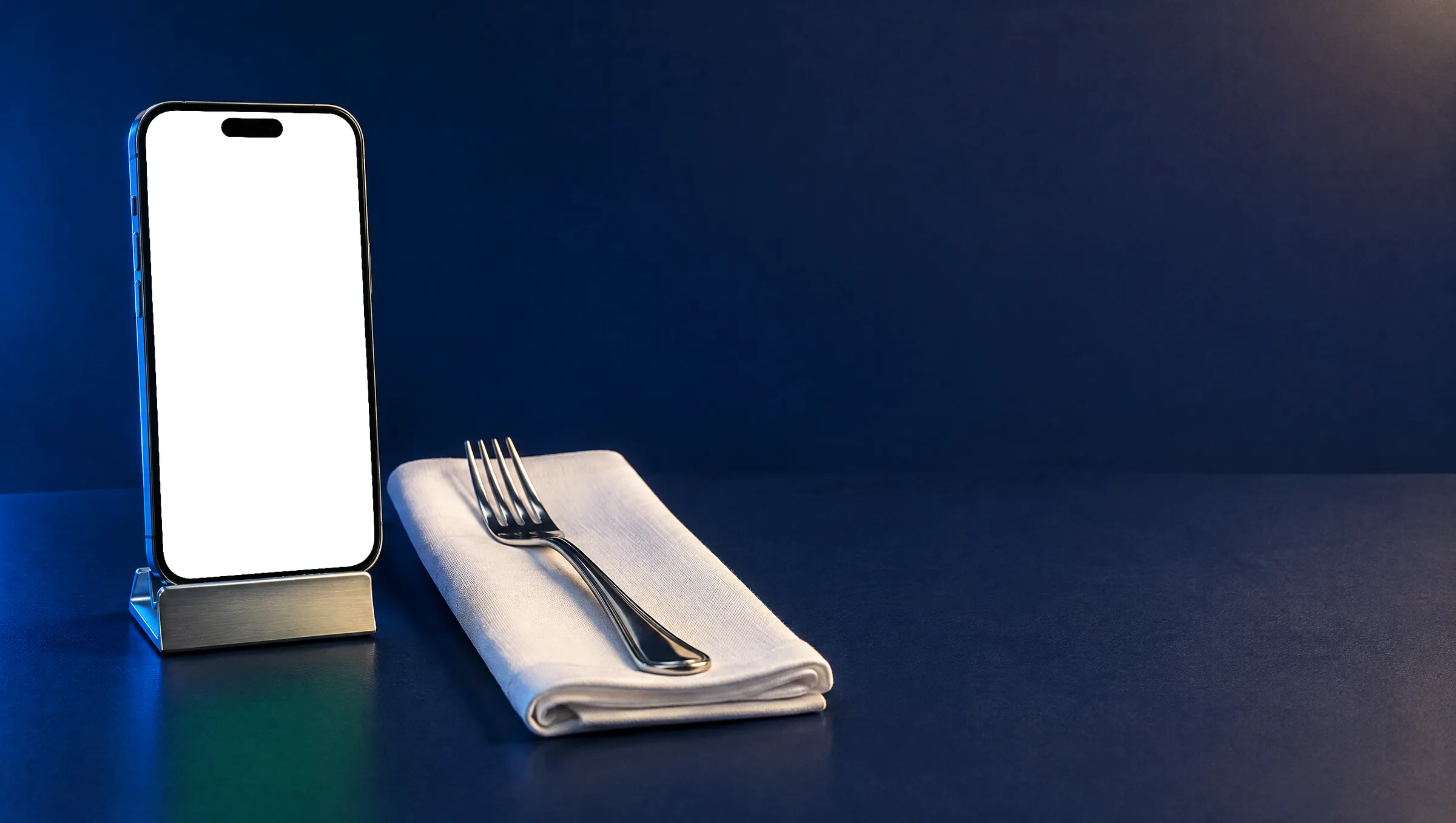 A phone on a stand beside a linen napkin and a fork, running the Bayt Sumac concept booking site